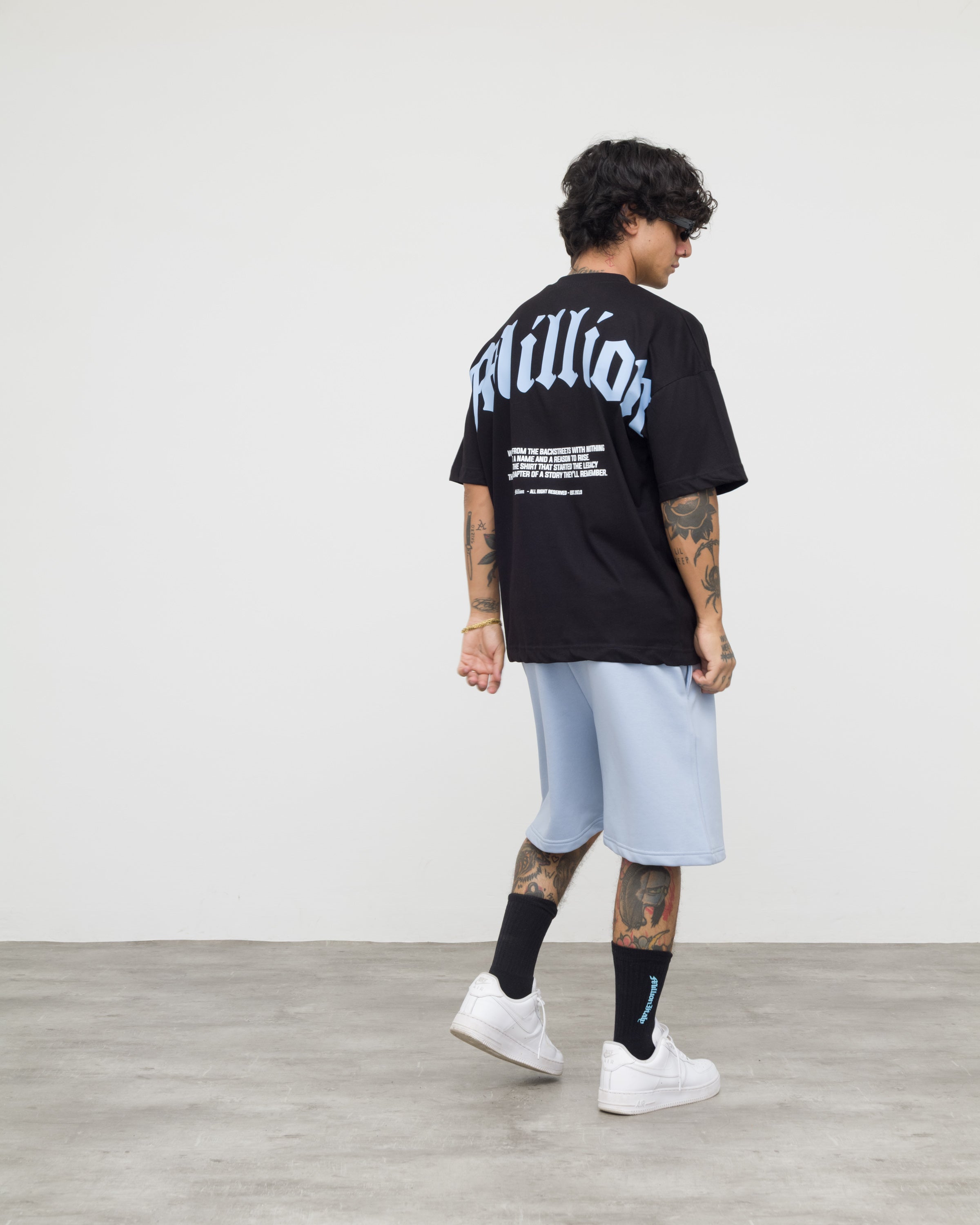 T-Shirt Nera Origin Azzurra