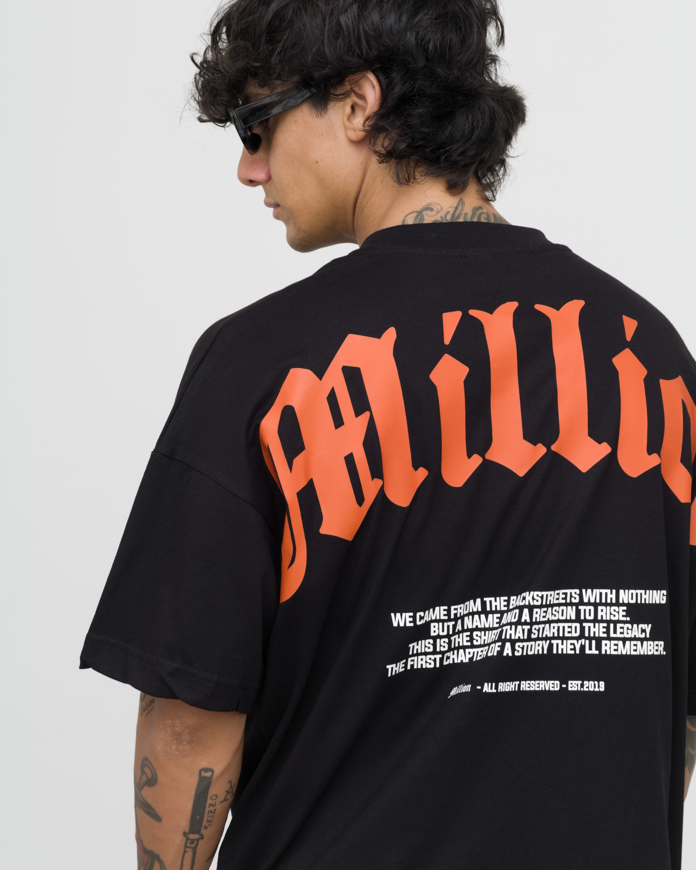 T-Shirt Nera Origin Arancio